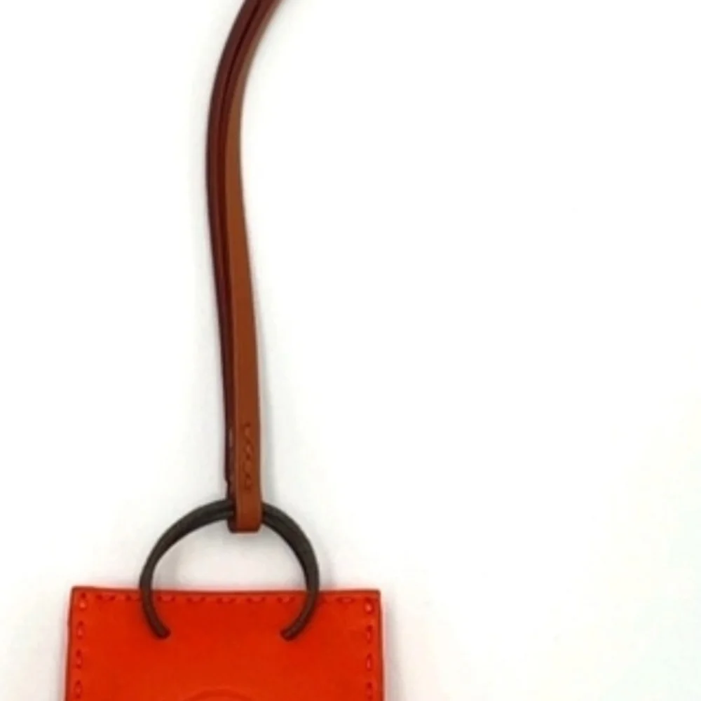 HERMÈS ORANGE LEATHER MINI POUCH BAG CHARM KEY HOLDER + BOX